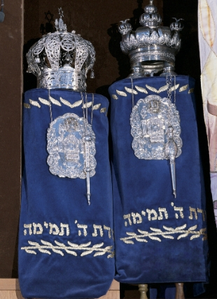 Photo of two blue torah scrolls