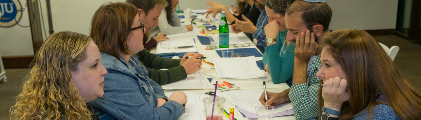 Photograph of group of students working on collaborative project