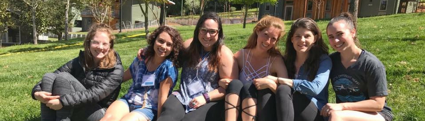 Photograph of BCI women sitting on lawn