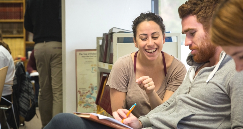 Photograph of an intro couple learning together