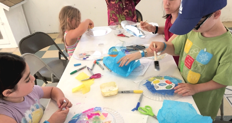 Photograph of children doing art projects