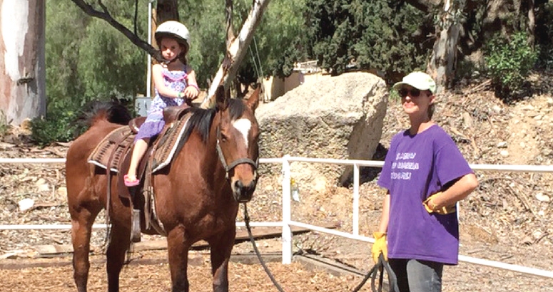 Photograph of horse back riding