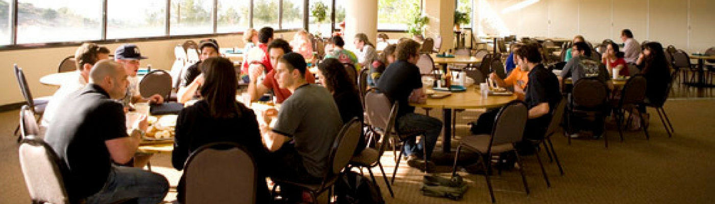 Image of students eating in Berg Dining Hall at AJU