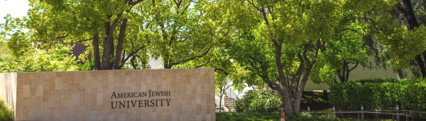 Photo of AJU signage in front of campus in Bel-Air