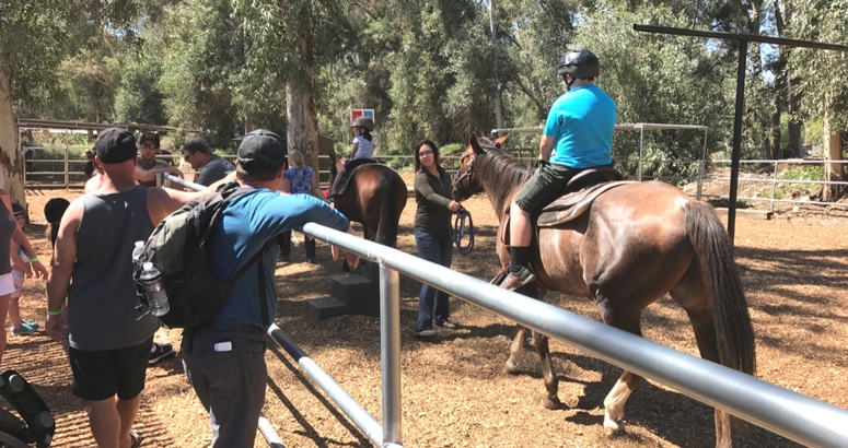 Photograph of horse back riding