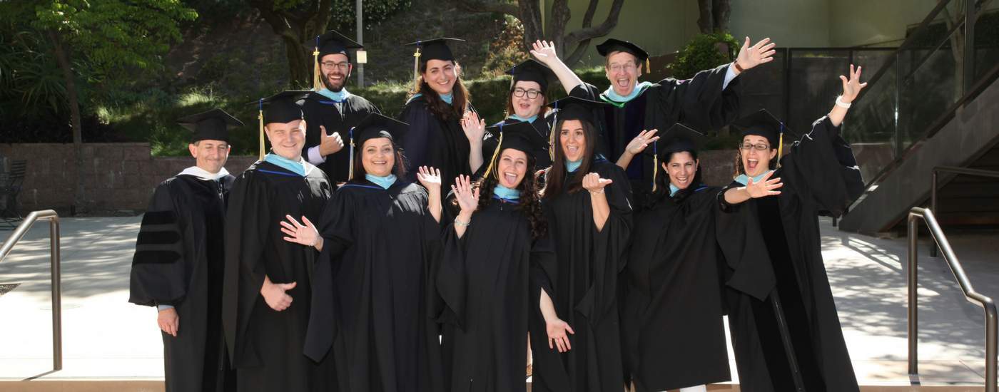 Photograph of Faculty in Caps and Gowns