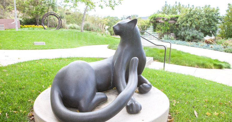 Photograph of sculpture " Big Twisting Cheetah"