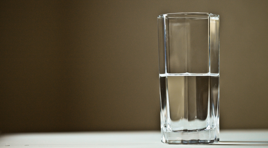 Photo of a glass half filled with water