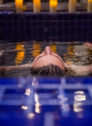 Photo of woman floating in mikveh