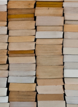 Photograph of paper back books in a stack