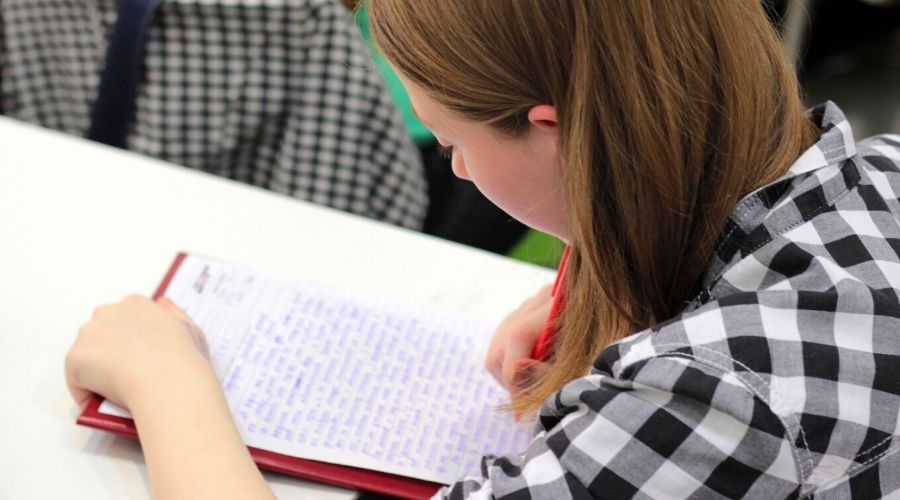 Photo of Woman writing