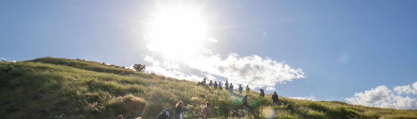 Photo of hikers on a hill