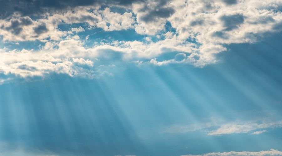 sun shining through clouds