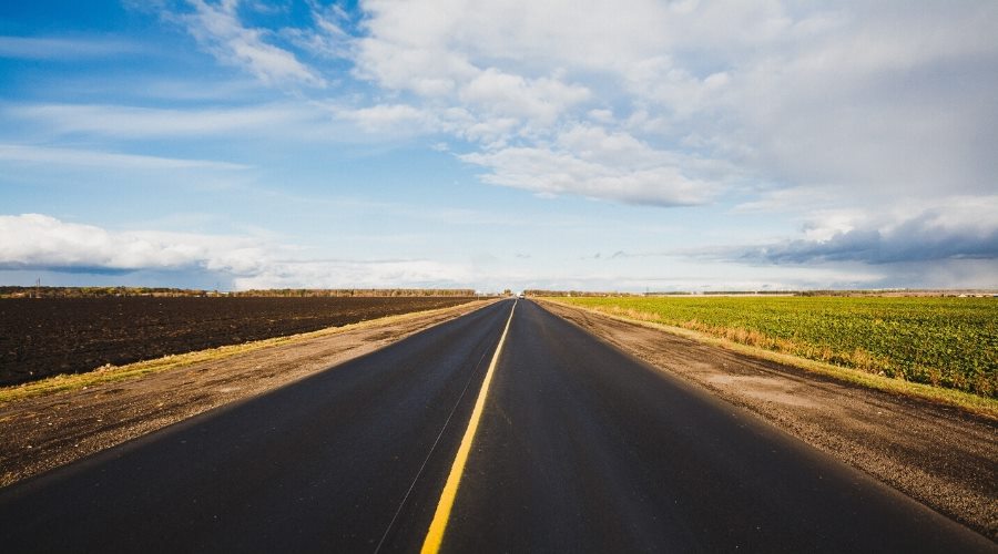 an empty highway stretching towards the horizon