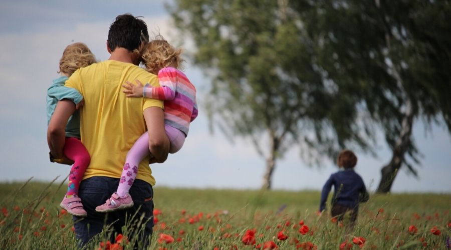 a family playing outside