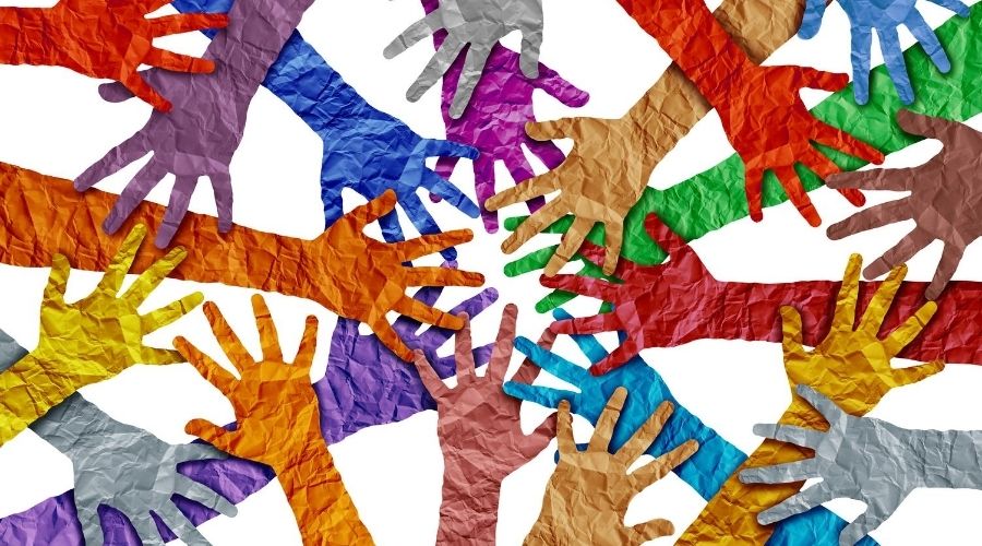 Image of cutouts of colorful hands