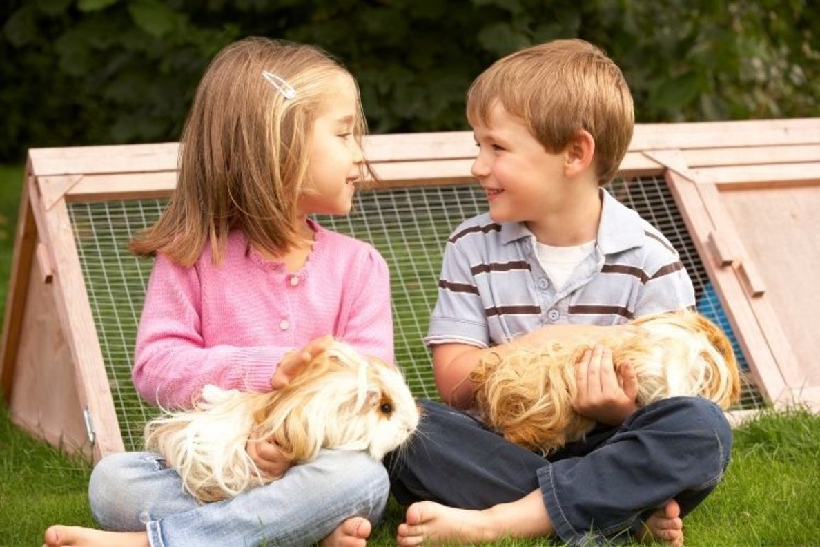 Young boy and girl looking at one another