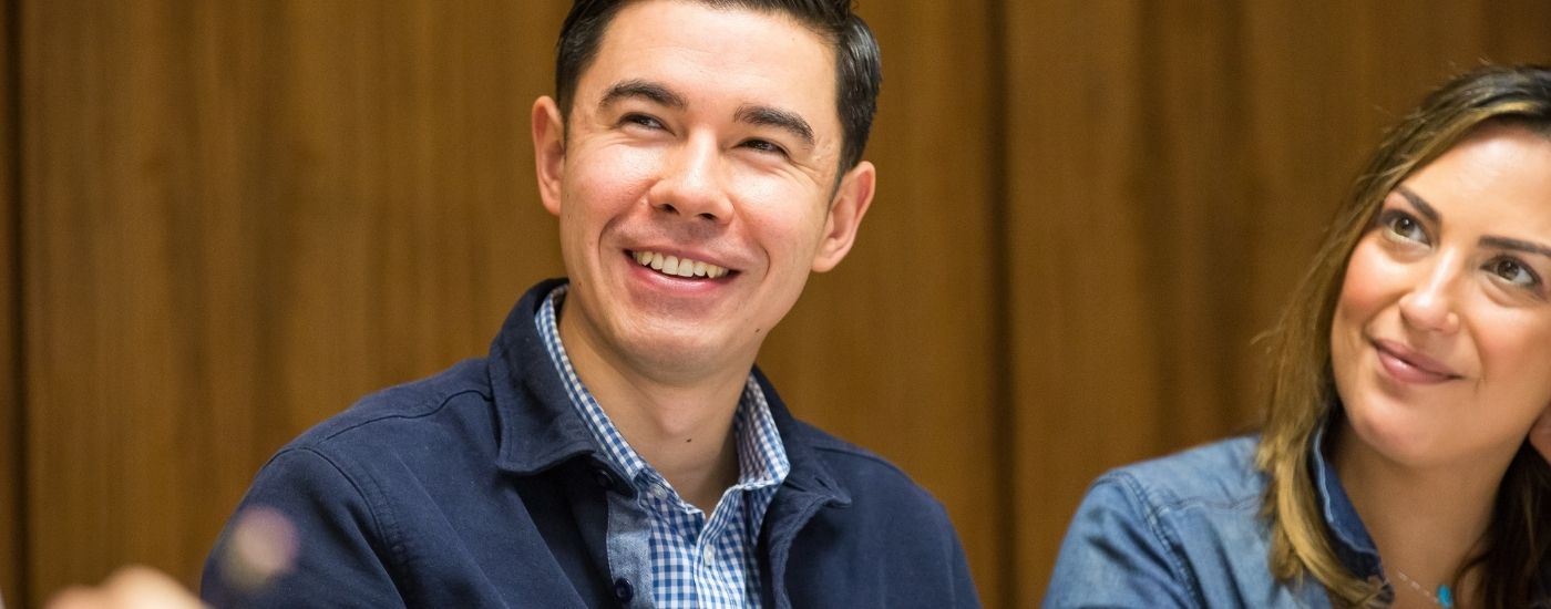 Man and Woman Smiling in Class