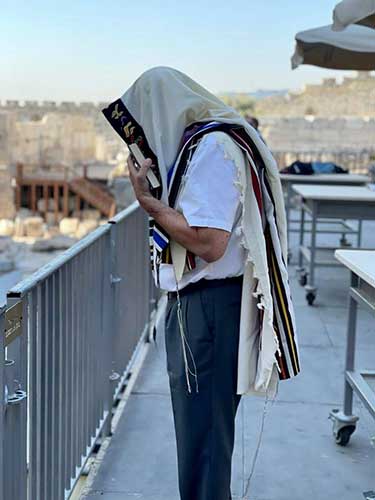 Praying at the egalitarian Kotel (Western Wall)