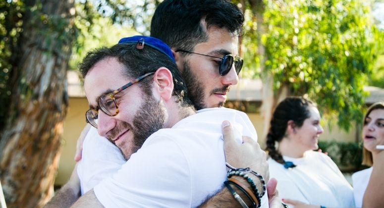 Two BCIers hugging