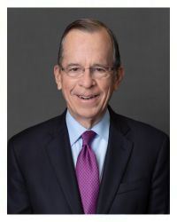 Headshot of Admiral Mullen Wearing a Suit with a Purple Tie