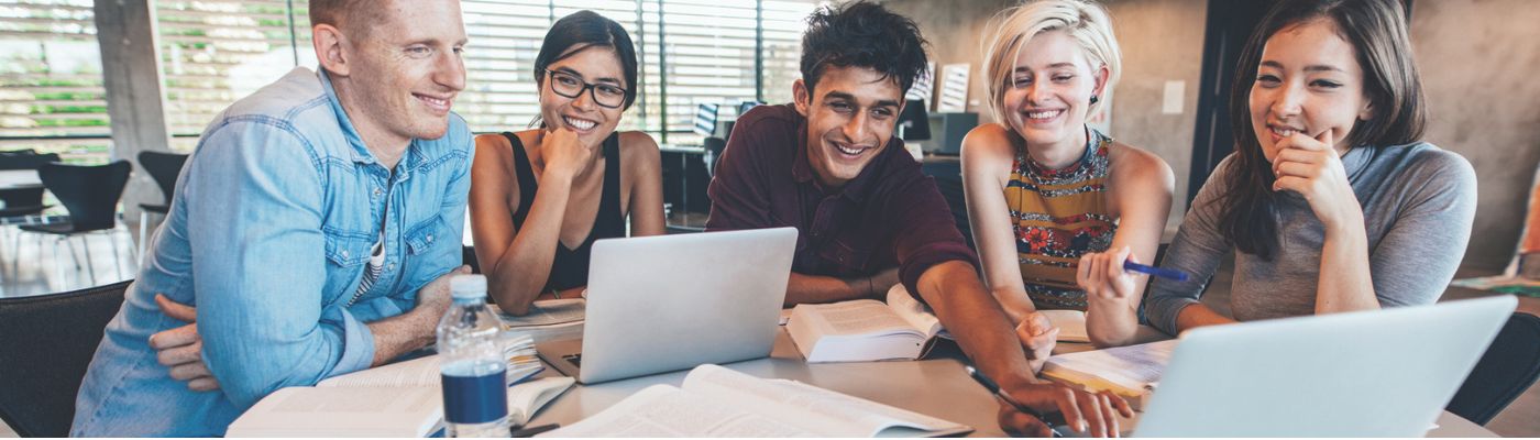 Students around a laptop