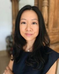 Headshot of Michelle Young in black top
