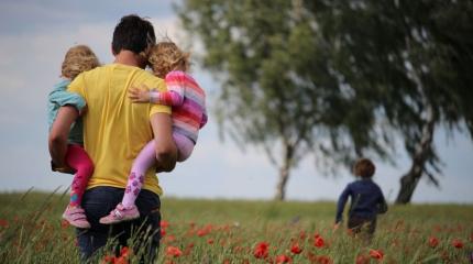 a family playing outside