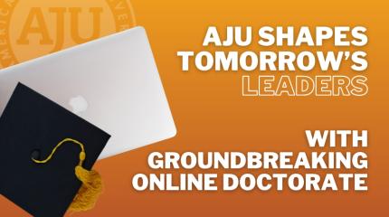 Laptop and graduation cap
